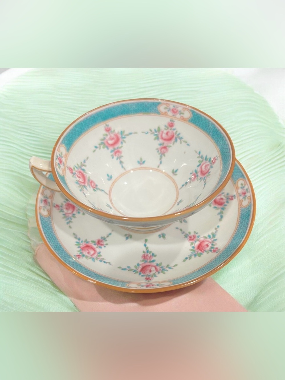 vintage 1900 Minton Persian Rose pattern porcelain teacup and saucer.